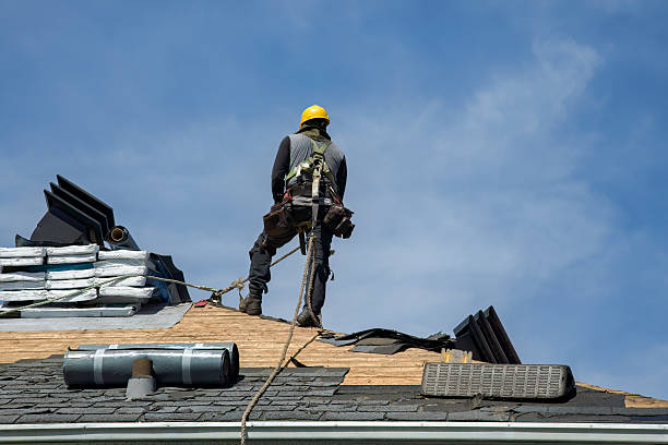 Professional Roof Replacement technician working in Amherst, WI